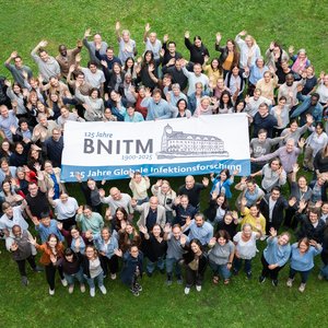 BNITM has over 400 members of staff. Group photo with BNITM employees in the garden