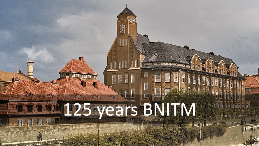 BNITM-125-Banner Historical building with striking architecture in front of a cloudy sky. Text: ‘125 years of BNITM’
