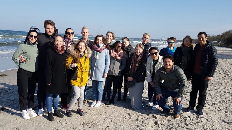 Spielmann group retreat at the beach Group of people at the beach in jackets