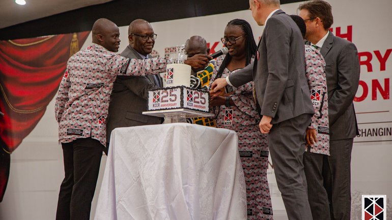 Cutting the birthday cake A diverse group cuts the KCCR birthday cake.