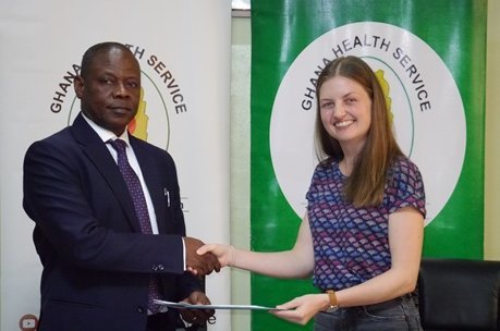 Handshake between Director of Ghana Health Service and Lab Group leader of BNITM after MOU signature