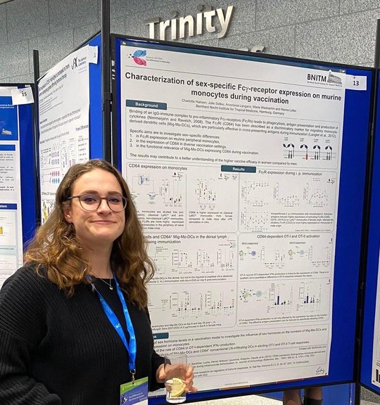 Charlotte Hansen from RG Lotter presenting her poster at the conference Charlotte Hansen from RG Lotter presents her poster at the Dublin Conference and smiles into the camera